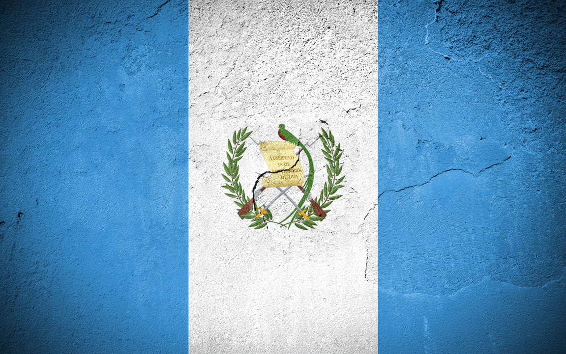 Guatemala flag on cracked wall